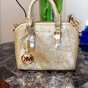 Mini gold crossbody bag